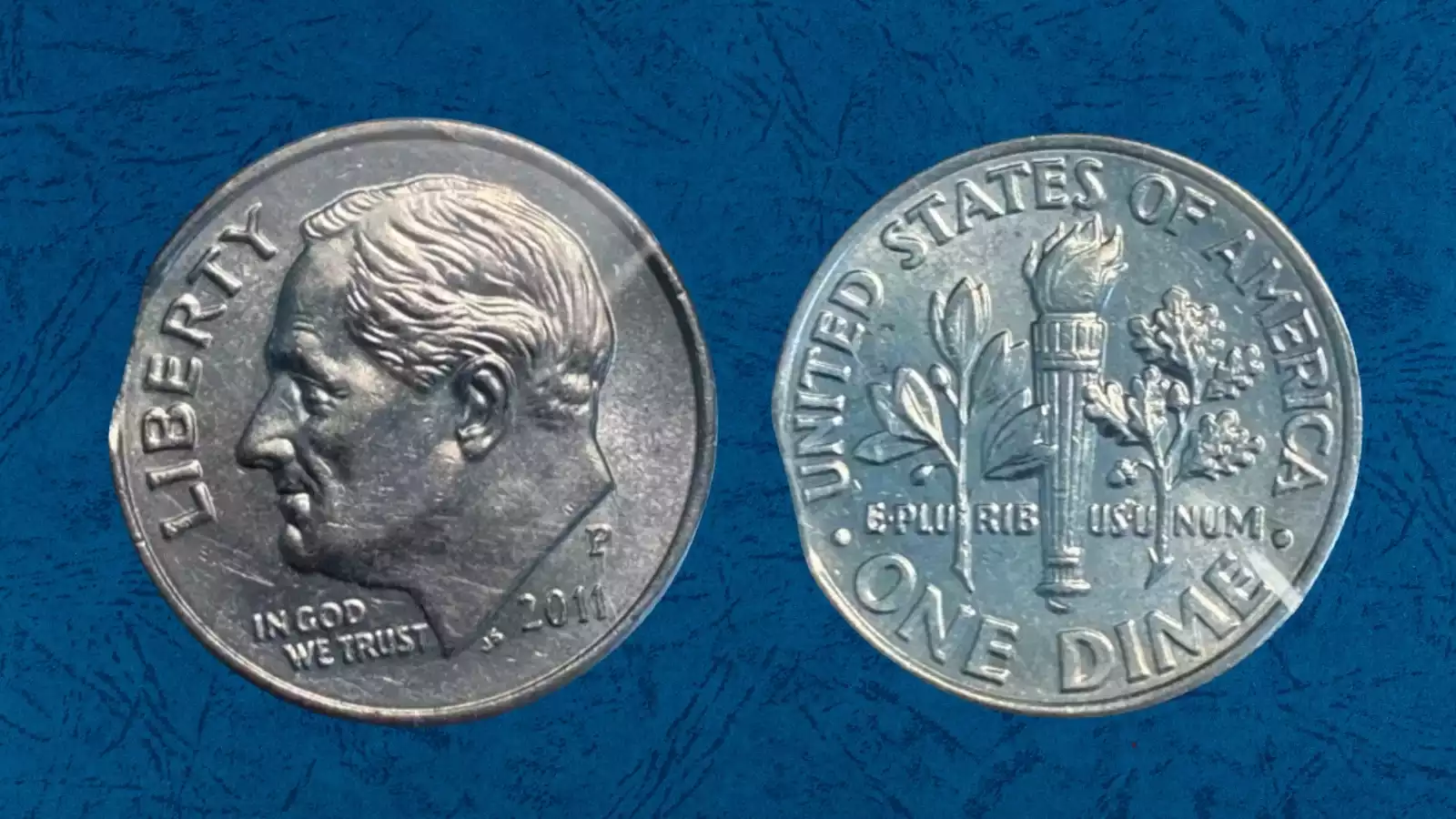 2011 Roosevelt dime wrong planchet error struck on Jefferson nickel planchet showing larger size and Roosevelt design