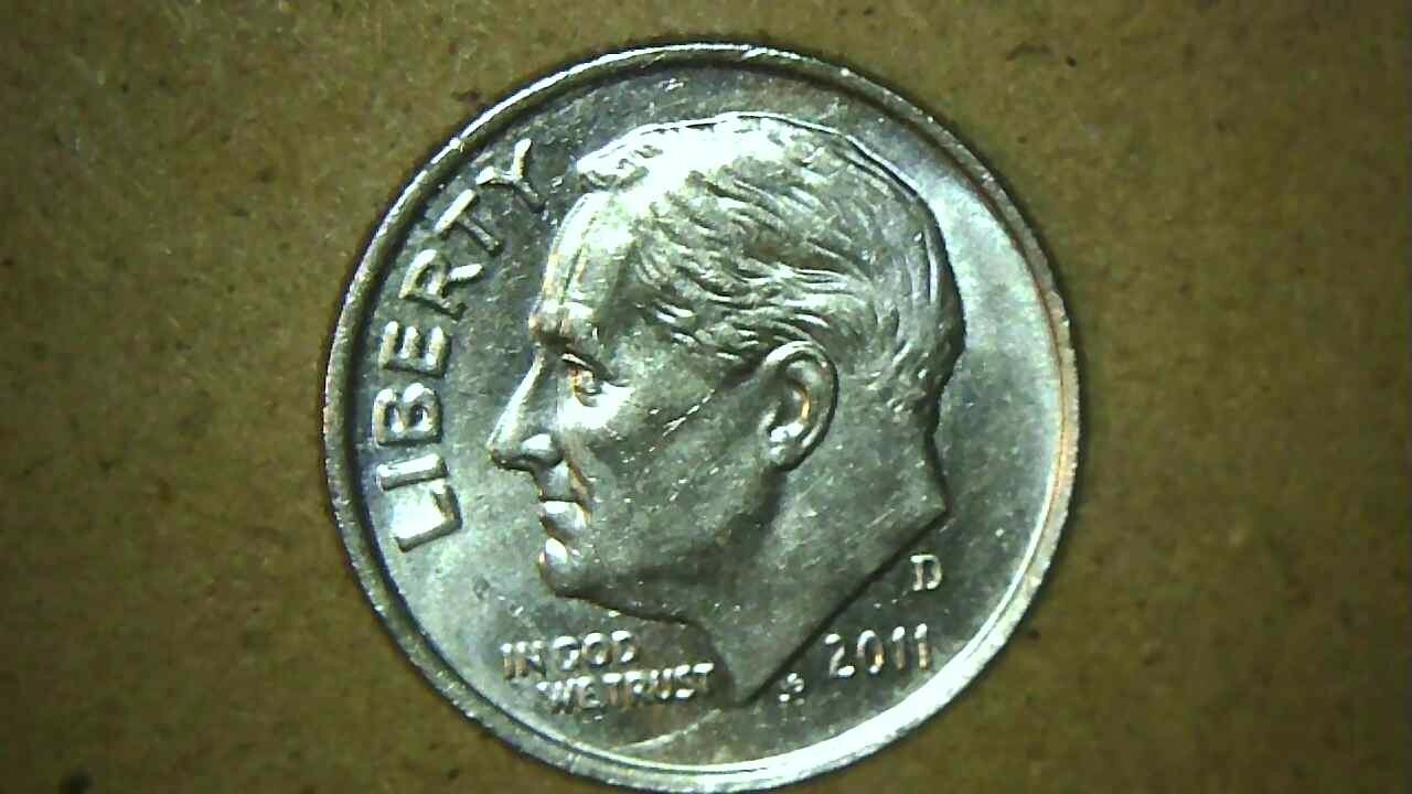 2011 Roosevelt dime die crack error showing raised crack line running across the coin's obverse surface