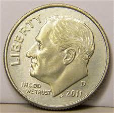 2011 Roosevelt dime struck-through error showing incuse depression where debris was trapped between die and planchet during striking